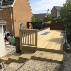 Decking area with timber steps and railings