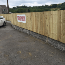 Feather edge fencing in carpark